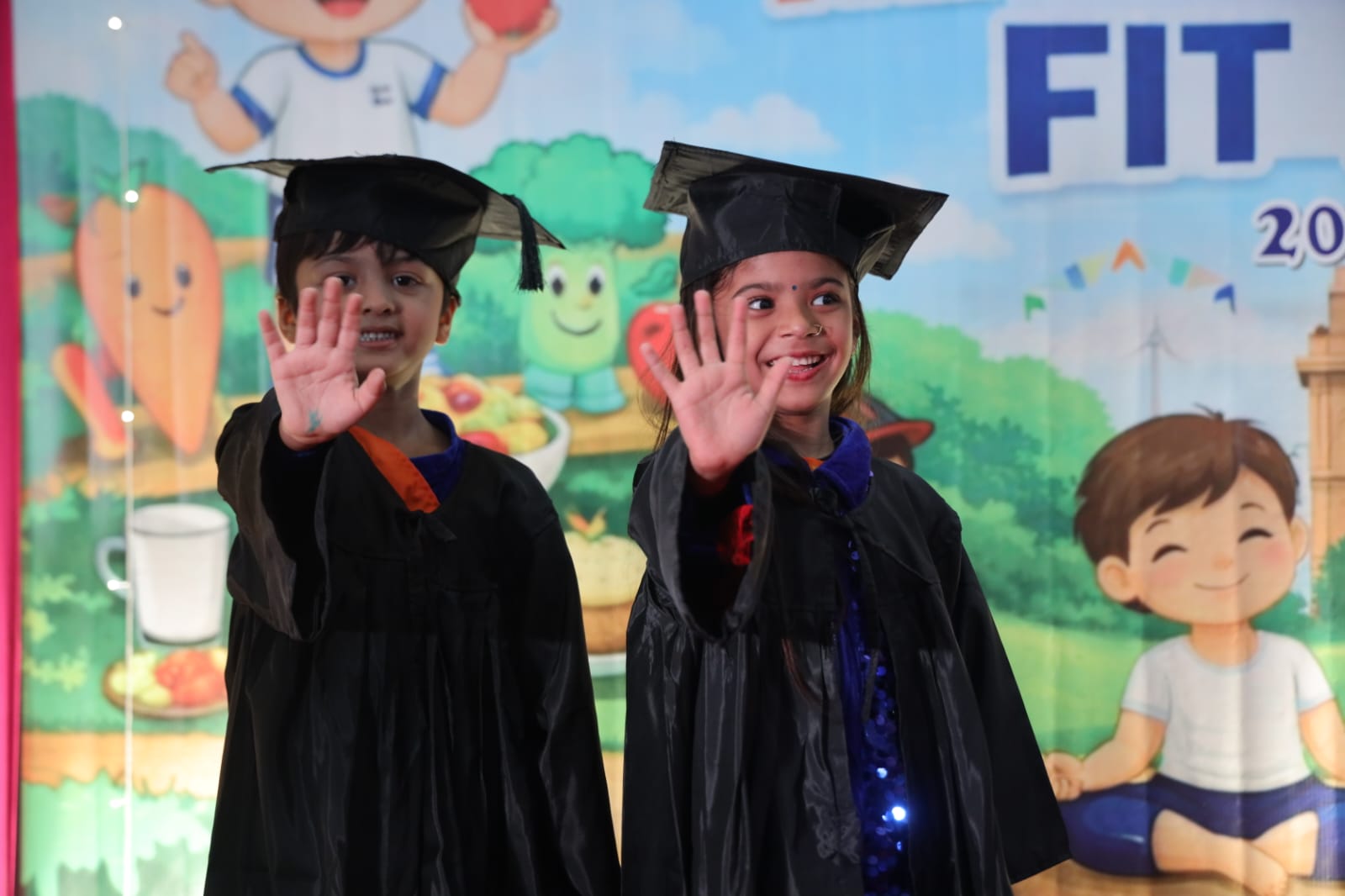 Our little graduates waving goodbye